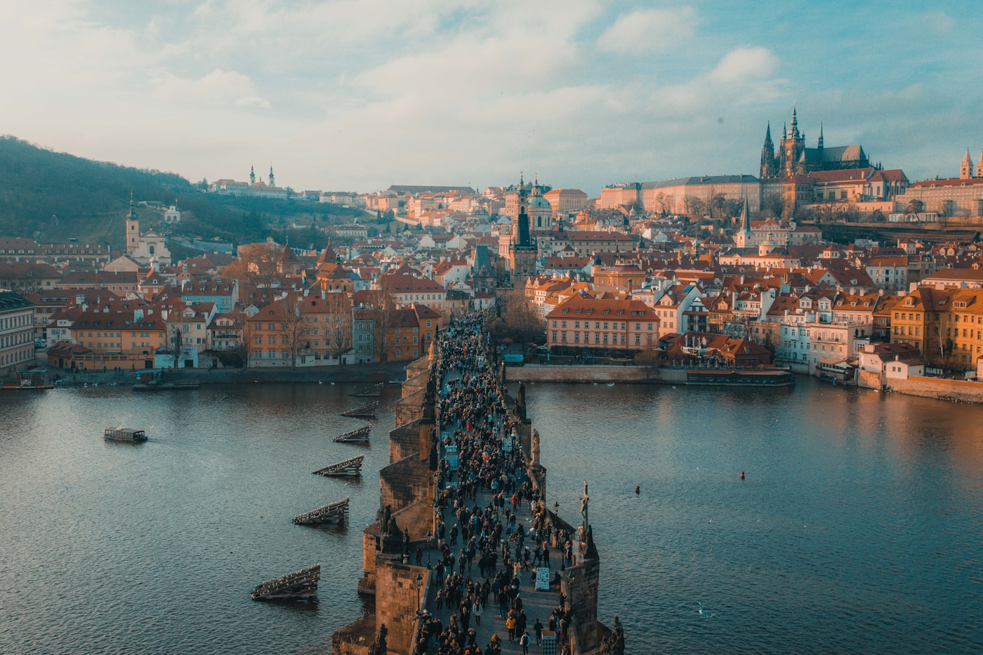 Aerial view of Prague cityscape with Vltava river and historic bridges